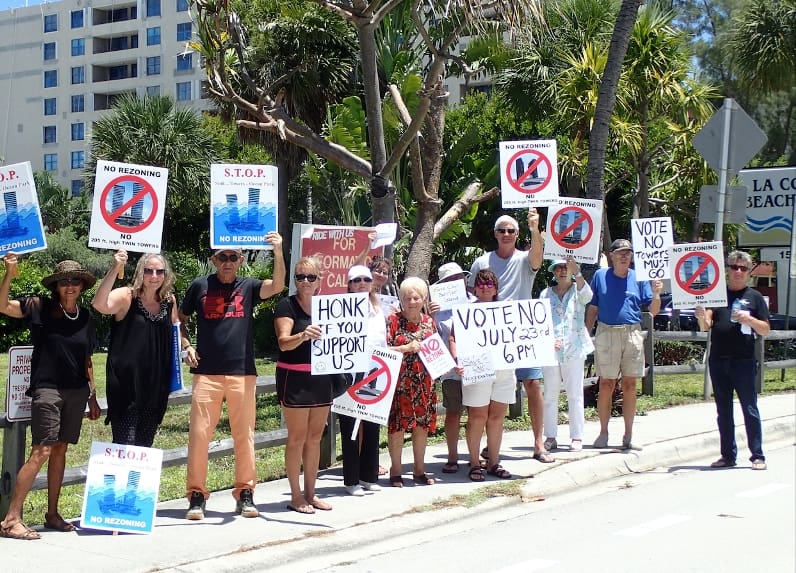 These protestors are against the building of Pompano Beach "Twin Towers" on A1A.