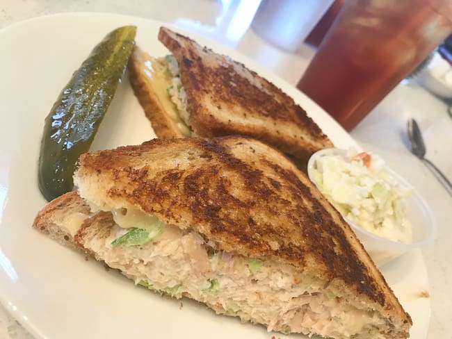 A tuna melt and a pickle spear at Lester's Diner in Pompano Beach.